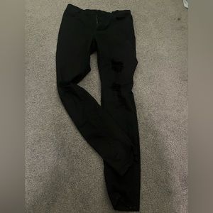Black skinny jeans ripped jeans. Size 4